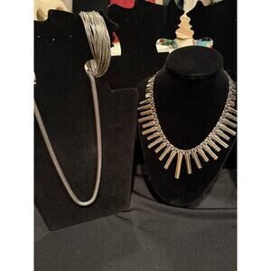 Lot of 3 pieces of silver tone jewelry, 2 necklaces and a bracelet